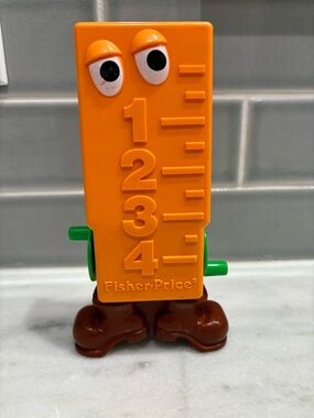 vintage 1982 Fisher-Price "Terry Tape Measure" from the "Curious Critters" serie